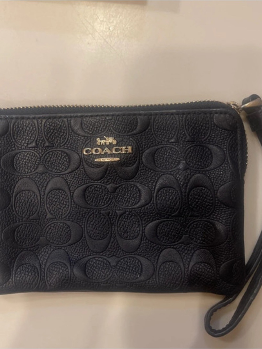 Coach Black Embossed Signature Wristlet with Gold Logo